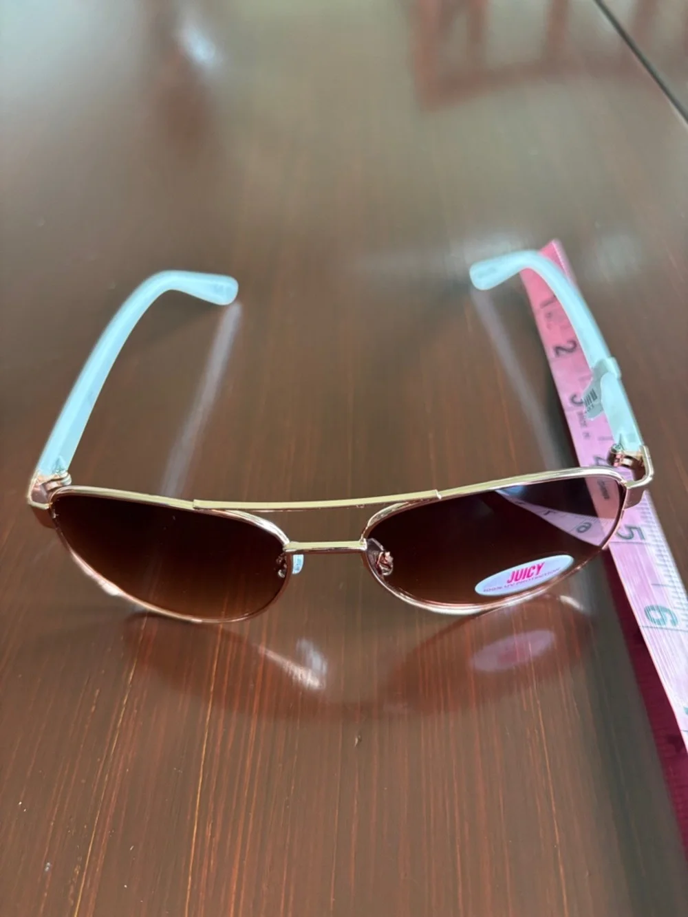 Juicy Coutture 100% UVA-UVB protect,brown gradient lens,gold frame,white arms